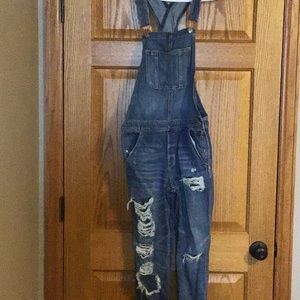 American Eagle distressed overalls size small.